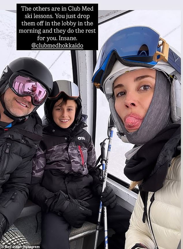 The mother-of-four's happy moment comes after she celebrated Christmas in style at a very expensive Japanese ski resort. Pictured with husband Chris and their son Oscar