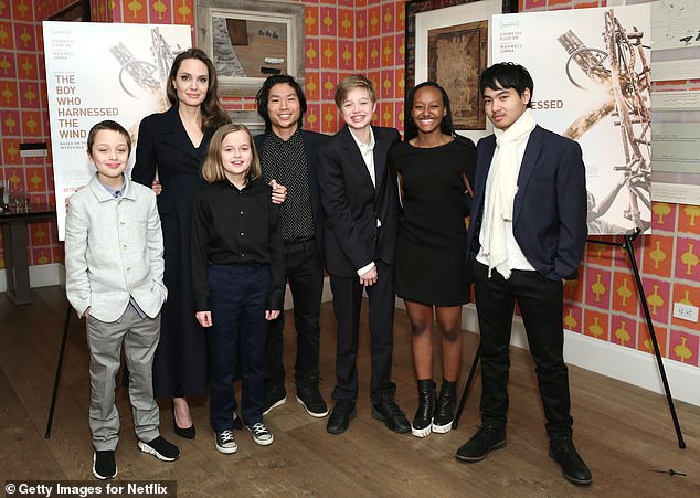 Best known as “Brangelina,” the former couple share three biological children — Shiloh, 18, and twins Knox and Vivienne, 16 — as well as their adopted children Maddox, 23, Pax, 21, and Zahara; Angelina seen with their children in 2019