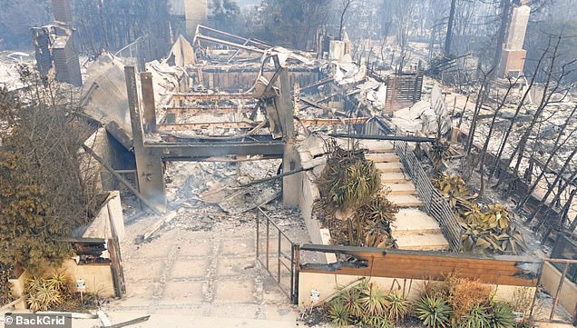 Photos reveal the charred remains of the classic colonial home, with little more than a scorched fence as the only trace of what was once a beautiful property