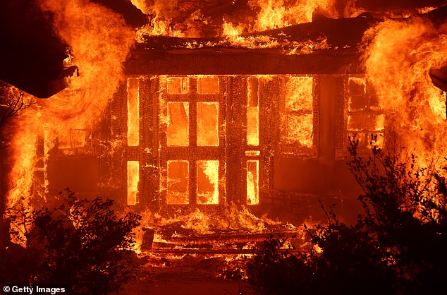 The actor is among tens of thousands of Los Angelinos ordered to flee as wildfires continue to rage. Pictured: Fire engulfs a home as the Eaton Fire moves through the area