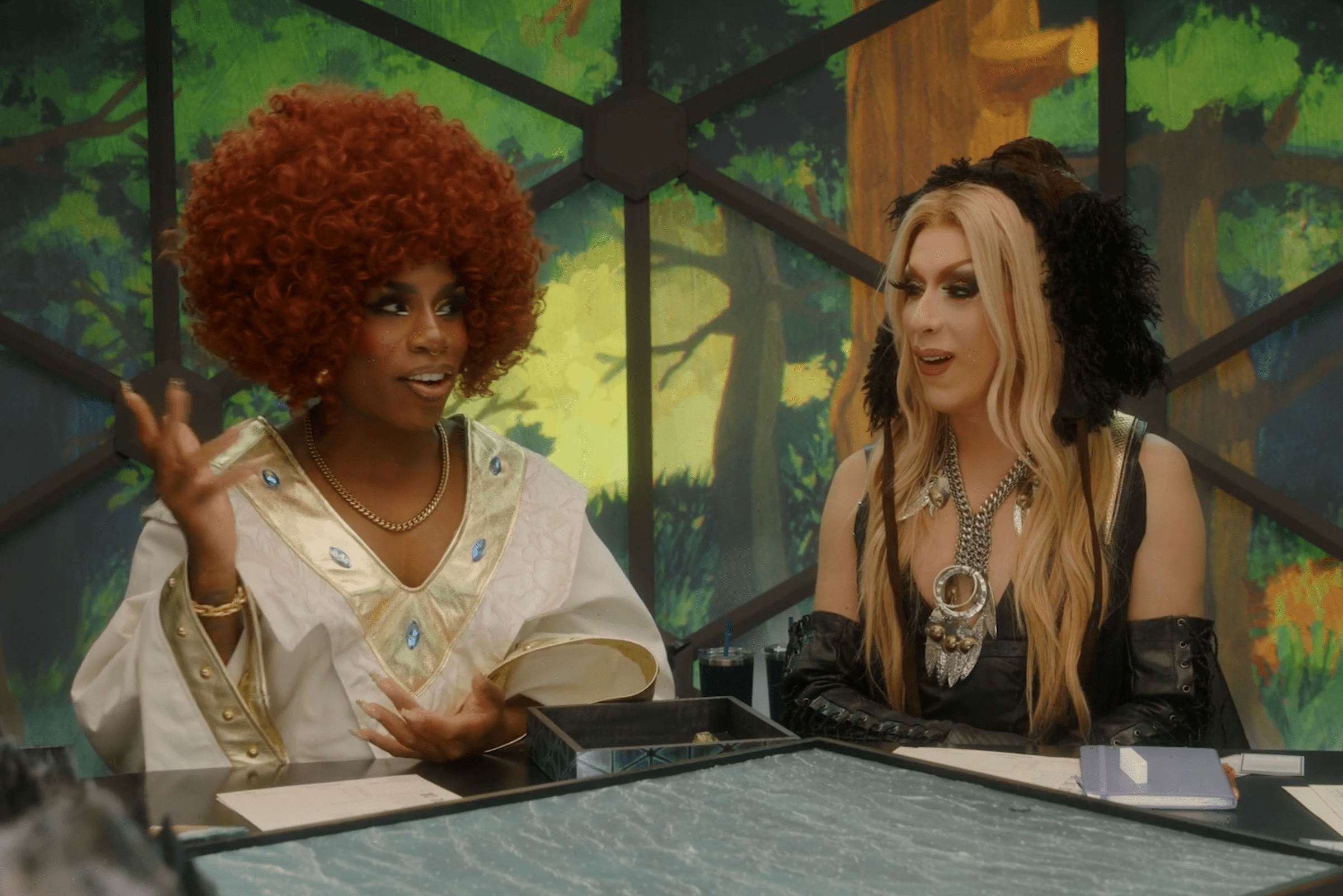 Monet X Change and Alaska Thunderfuck are in the Dimensional Dome in Dungeons and Drag Queens.