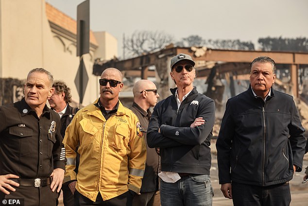 He lashed out at California Governor Gavin Newsom, pictured second from right, for laughing at one of the command centers