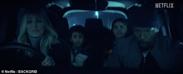 The trailer opens with Emily and Matt driving towards a restaurant with their children, but they make a quick pit stop at a gas station.