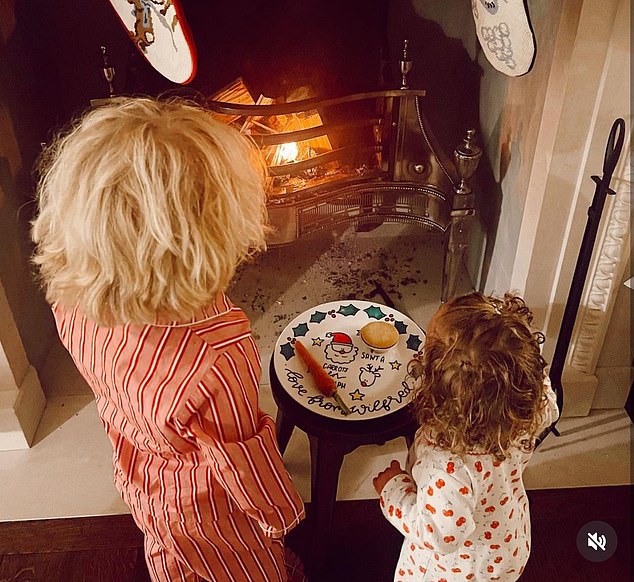 In 2022, Carrie shared this adorable photo of Wilfred and Romi preparing a mince pie and carrot for Santa on Christmas Eve