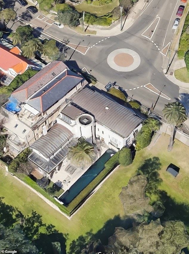 The $500,000 supercar crashed into the wall of a harborside mansion that sits on a roundabout in Watsons Bay