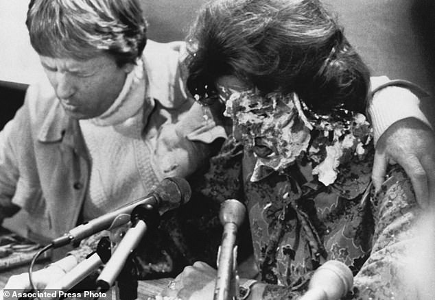 A pie is thrown at Anita Bryant during a press conference on October 14, 1977 in Des Moines, Iowa