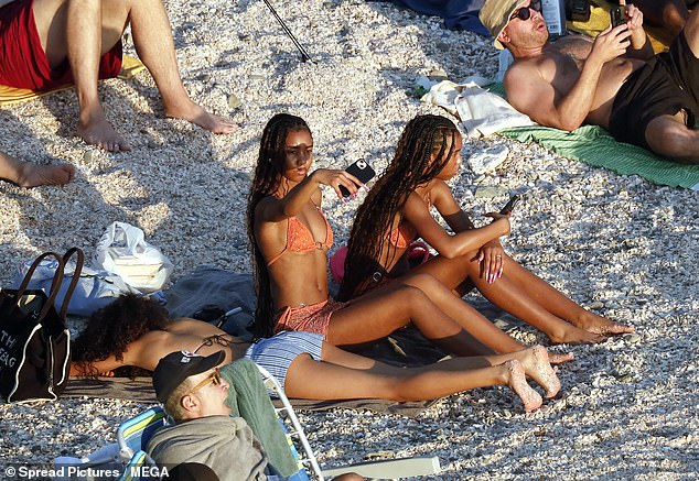 Identical twins Jessie and D'Lila, who turned 18 the week before Christmas, were photographed in eye-catching matching bikinis