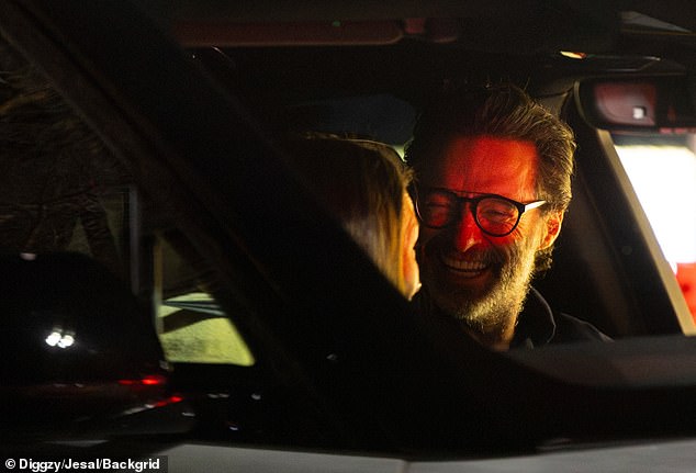 Jackman looked defeated as he laughed with Foster in the car