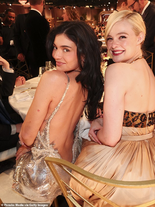 The wardrobe malfunction was easy to spot when Kylie took photos with A-lister Elle Fanning