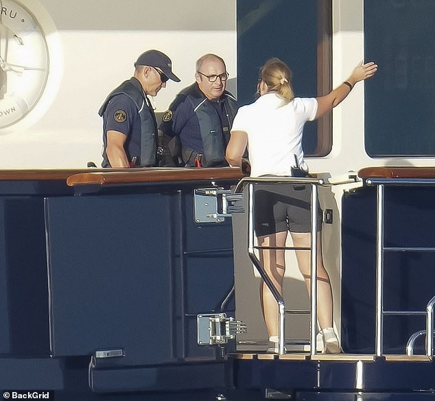 DailyMail.com has exclusively obtained photos of the moment customs officials boarded the ship while it was parked near St. Barts on New Year's Eve