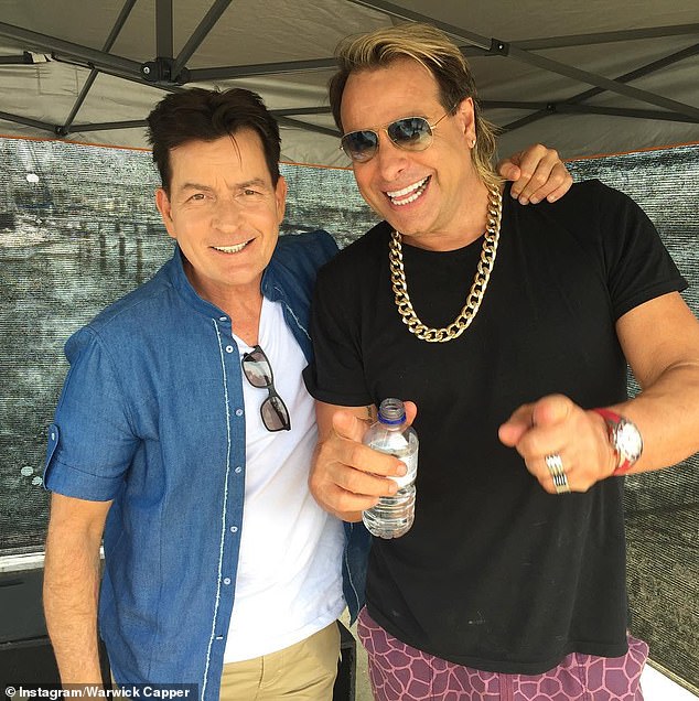 Capper, 61, was 'over the moon' after his son Indiana told him his long-term partner is pregnant (pictured, with actor Charlie Sheen)