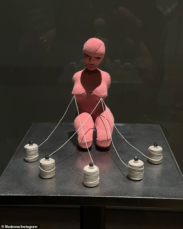 She fittingly surrounded the plethora of photographs with Louise Bourgeois's sculpture, The Good Mother, from his Tokyo exhibition which she referenced in the caption