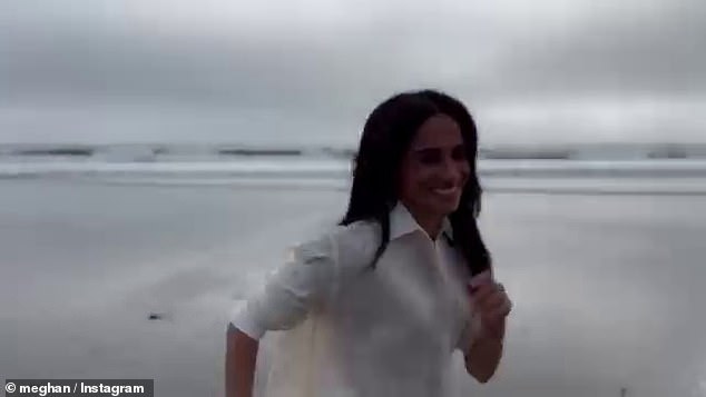 Meanwhile, in the video shared to her new account yesterday, the Duchess can be seen walking towards a shoreline on the beach - in a clip filmed by Prince Harry