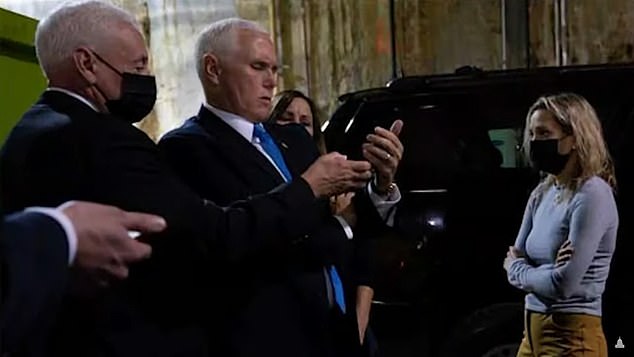 Vice President Mike Pence (second from left) is photographed with wife Karen (center) and daughter Charlotte (right) at a secure location where he was held during the attack on the Capitol on January 6, 2021