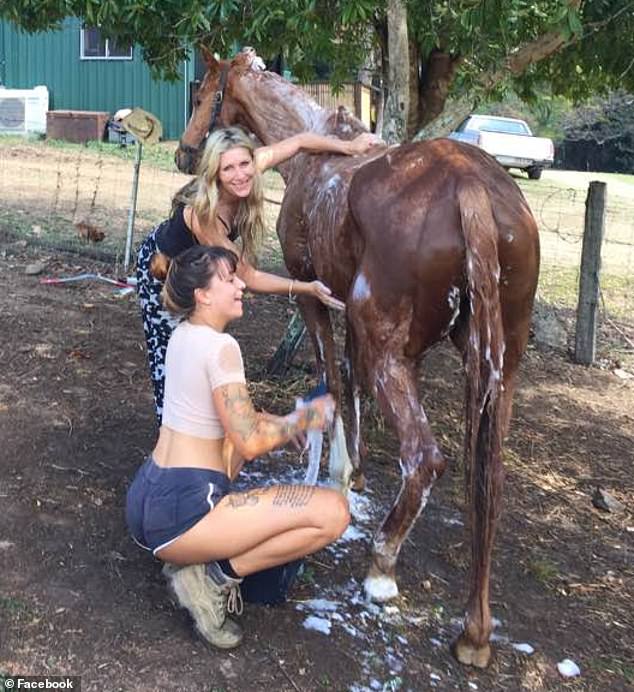 Emmy Finberg is pictured working as a farmhand on an estate near Byron Bay