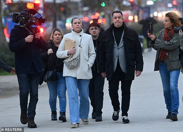 Caroline Darian and David, the children of French Gisele Pelicot, arrive to attend the verdict