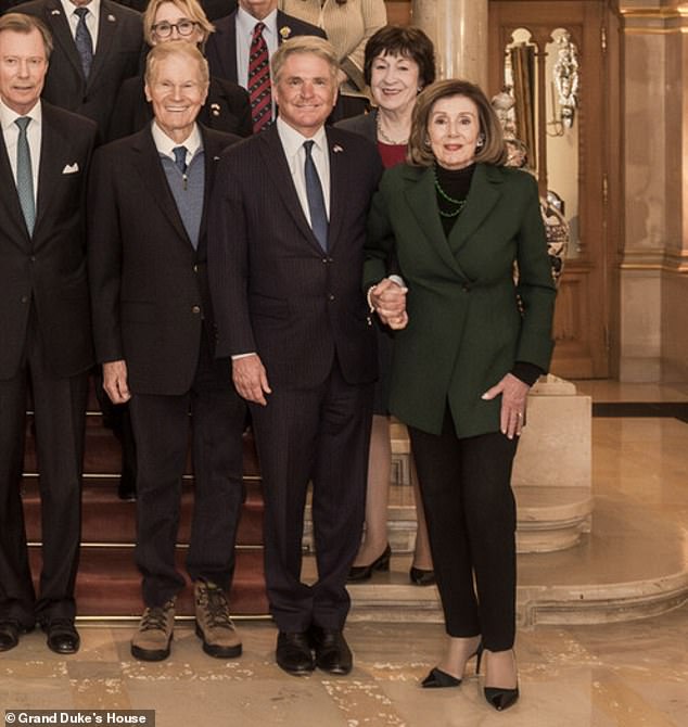 Pelosi introduced herself on December 13 before being rushed to the hospital. Here she is seen grabbing the hand of Rep. Michael McCaul (R-Texas) after falling in Luxembourg