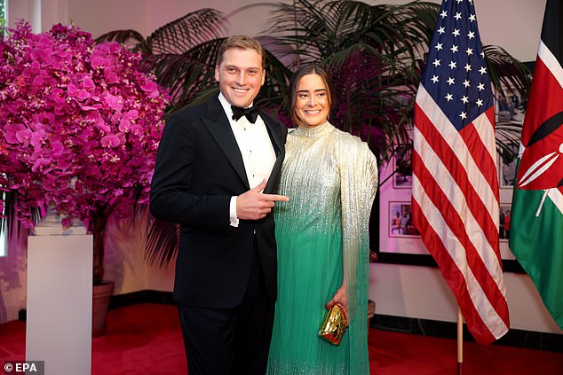 Naomi Biden (right), with husband Peter Neal (left), at a state dinner for Kenya in May. She kept her pregnancy a secret until election day. DailyMail.com reported that she was expecting the Kenyan state dinner the same month