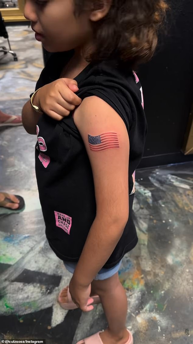 The artist said he convinced the girl to ink the American flag on her arm instead of Trump on her neck