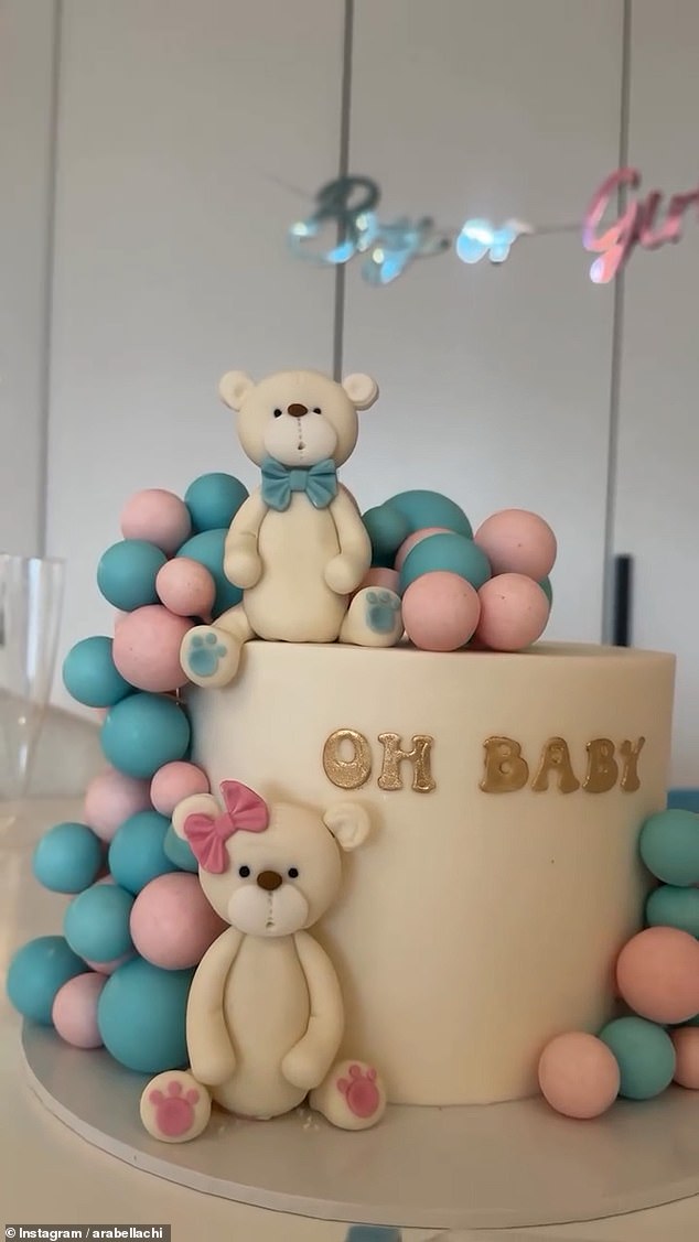 The clip featured sweet details from her gender reveal party, including pink and blue decorations, a white cake with 'Oh Baby' written on it and a clip of her baby scan.