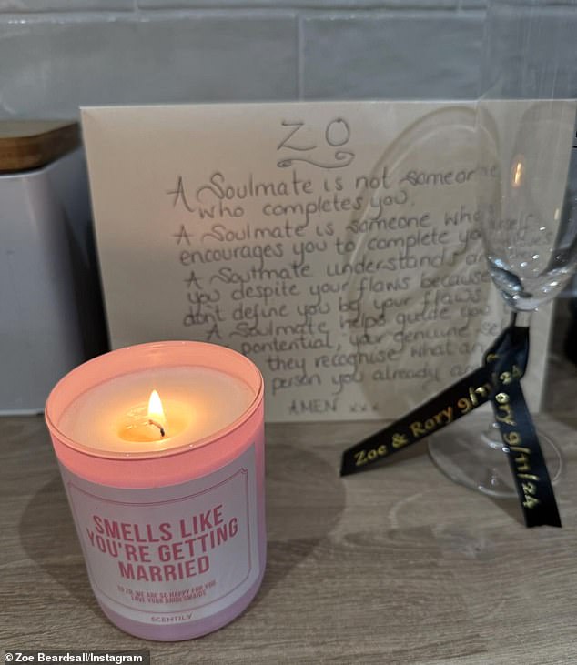 She shared a photo of the note next to a lit candle with the caption 