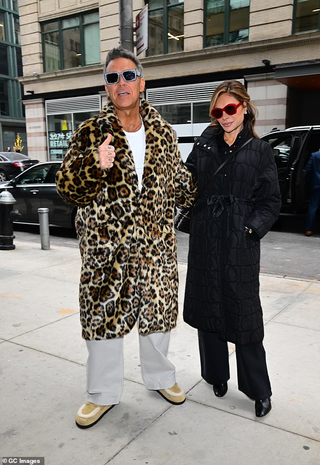 The pop star, 50, cozied up with his wife Ayda, 54, in the Big Apple after the couple revealed they had been evacuated from the fire-ravaged city