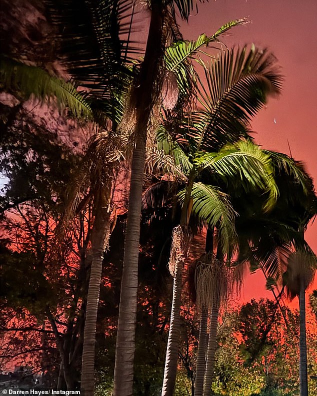 The Savage Garden singer shared updates on Instagram on Friday, telling fans he was safe and sheltered with his goddaughter's family. Darren posted an eerie photo of the blood-red sky