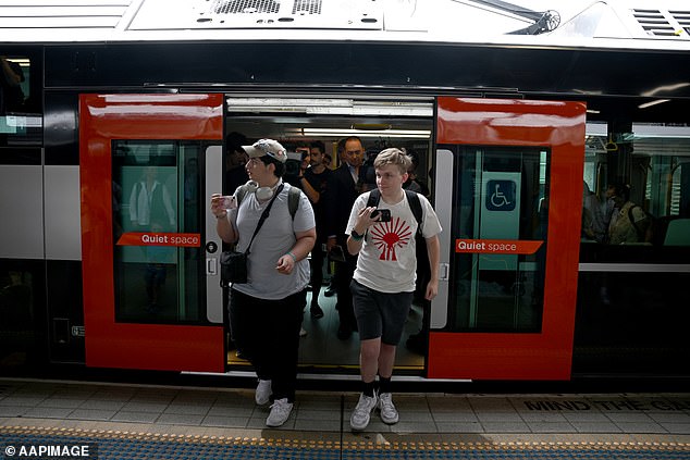 The cost of connecting NSW's two most populous cities could exceed $40 billion (pictured, passengers disembarking from train at Sydney Central Station)