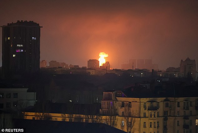 An explosion from a drone after it hit an apartment building is seen in the sky during a Russian drone strike, amid the Russian attack on Ukraine, in Kiev, Ukraine, January 10, 2025