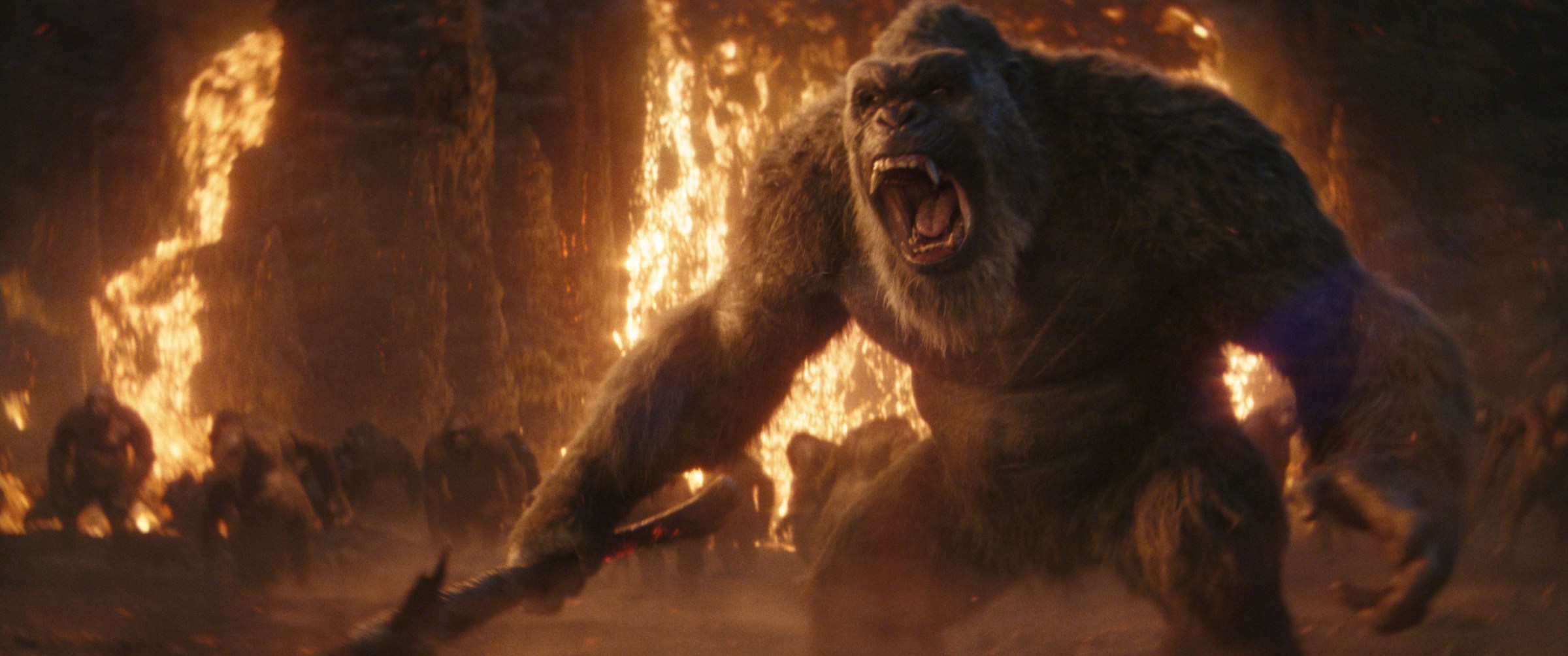 Kong roars with his ax in some sort of lava cave in Godzilla x Kong: The New Empire