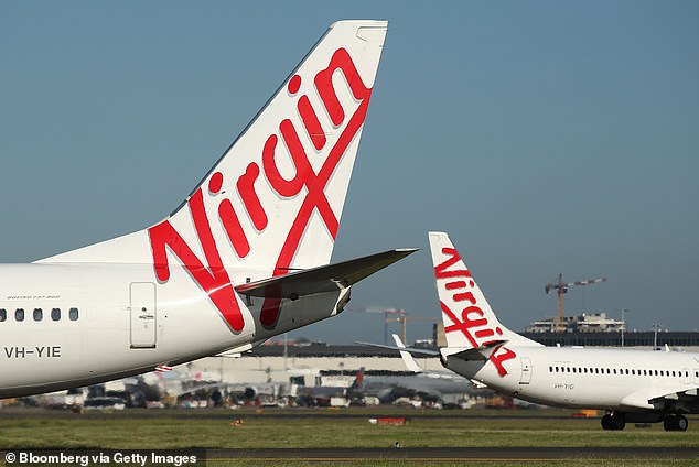 Virgin Australia airline staff are detained in Fiji over a