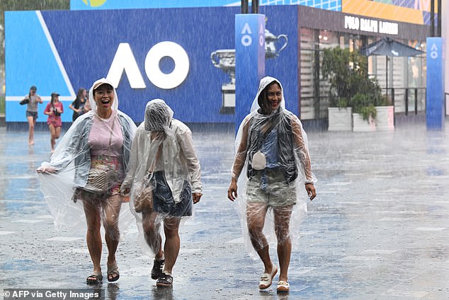 Melbourne is also expecting rain on Friday before clearing up over the weekend. The photo shows fans at the Australian Open earlier this week