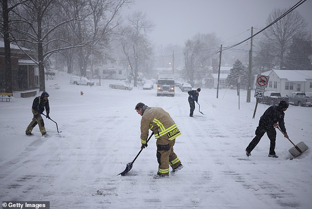 If six inches of snow fell in Dallas, it would be in the top five of recorded snowfalls. A jogger jogs down a snowy road in Louisville, Kentucky on January 5