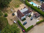 TOWIE's Sam Faiers sticks to the scorched grass hose pipe ban at her posh Surrey home - after ex Mark Wright put a lush green lawn on display at his Essex mansion