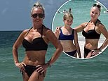 Strictly pro Kristina Rihanoff stuns in a black bikini as she hits the beach with look-alike daughter Mila, 10, during a family trip to Florida