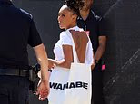 Mel B, 51, shows off her youthful glow as she returns to her Spice Girls roots with a band T-shirt and Wannabe bag