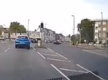 Moment Audi crashes head-on into a car on the wrong side of the road after speeding through the intersection