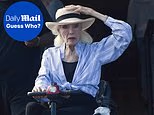 Iconic TV siren, 93, who played a 'cat devil' looks unrecognizable for decades after captivating fans in a leather catsuit... can you guess who?