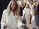 Love Island stars Molly Smith and Tom Clare land back in Manchester after their 10-day boozy wedding celebrations in Mallorca