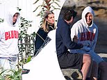 Sydney Swans player Chad Warner seen on tense outing with his girlfriend looking stone-faced as he breaks cover for the first time since hotel scandal with a stripper - but laughs with a friend just hours later