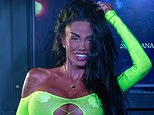 Katie Price lets her hair down as she performs her hit I Got U in a very racy neon cut-out outfit at Manchester Pride