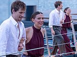 Millie Bobby Brown gets glamorous in a purple backless maxi dress as she hosts a romantic dinner on Lake Como with husband Jake Bongiovi as the couple enjoy a kid-free date night