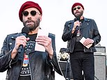 John Travolta rocks ANOTHER beret at Ramone's 50th anniversary tribute... after fans mercilessly roasted his 'crazy' style