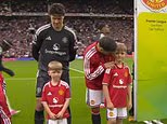Dignity despite tragedy: Sons of A66 victim PC Matthew Blades walk out as mascots for Manchester United as they take on Ipswich Town