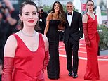 Claire Foy channels old Hollywood glamor in a red dress and opera gloves as George Clooney and his stunning wife Amal grace the red carpet at the premiere of Ink on the opening night of the Venice Film Festival