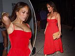 Jennifer Lopez, 57, almost walks out of her VERY low-cut red dress while out for dinner in New York