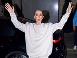 Celine Dion wears an oversized designer tracksuit as she meets fans and sings and dances outside the Le Royal Monceau hotel ahead of her concerts in Paris