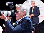 George Clooney plays sassy photographer on the Venice Film Festival red carpet as his film Furies receives rave reviews from critics