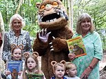 Happy Camilla! The Queen is full of laughter as she watches a Gruffalo storytelling session in Liverpool with author Dame Julia Donaldson