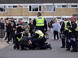 Anger over plans to quadruple the number of asylum seekers in homes near a military base, which will host at least 1,250 migrants